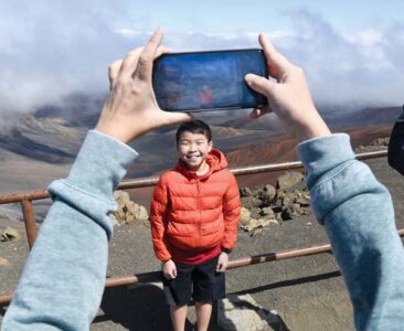 Wind-whipped visitors atop Haleakala